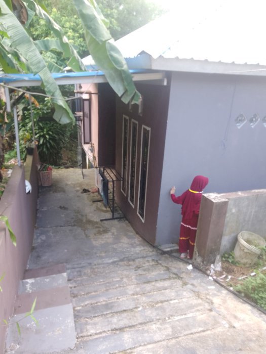Rumah di tengah kota