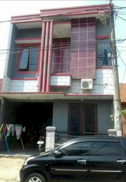 jual rumah 2 lantai (paling atas beton siap bangun) Tembok bata merah