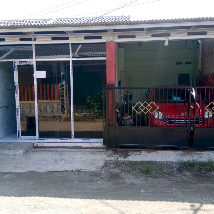 Rumah sudah dengan renovasi depan pintu kaca