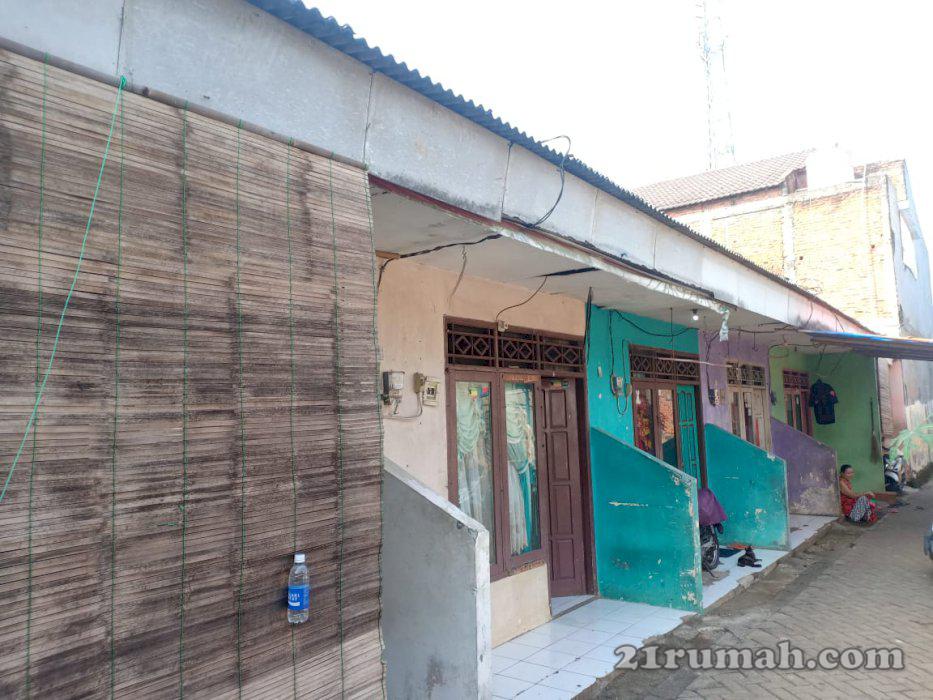rumah 2 lantai plus kontrakan 6 pintu