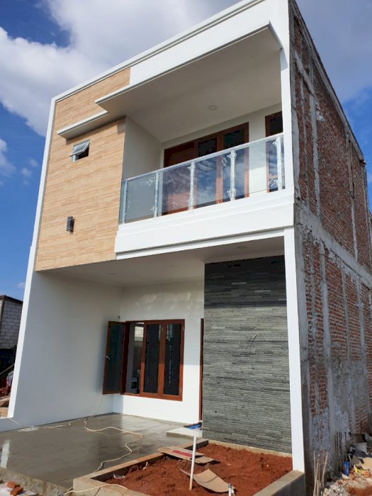 Rumah di jual cepat 2  lantai Lokasi strategis deket Tol pondok Aren