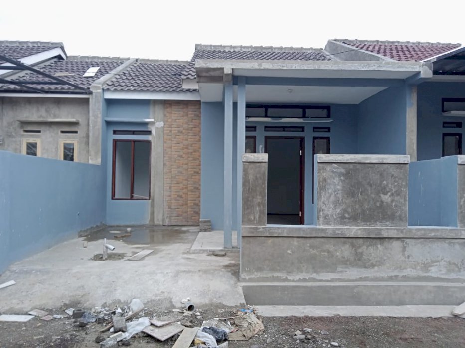 Rumah minimalis lokasi asri dekat pusat kota