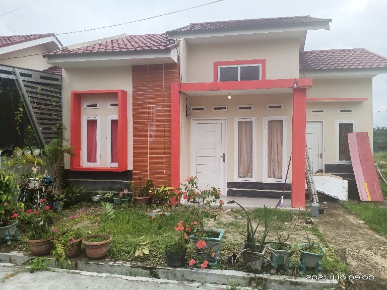 Dijual Rumah BARU MINIMALIS DP 15 juta jl UKA garuda sakti pku Kota