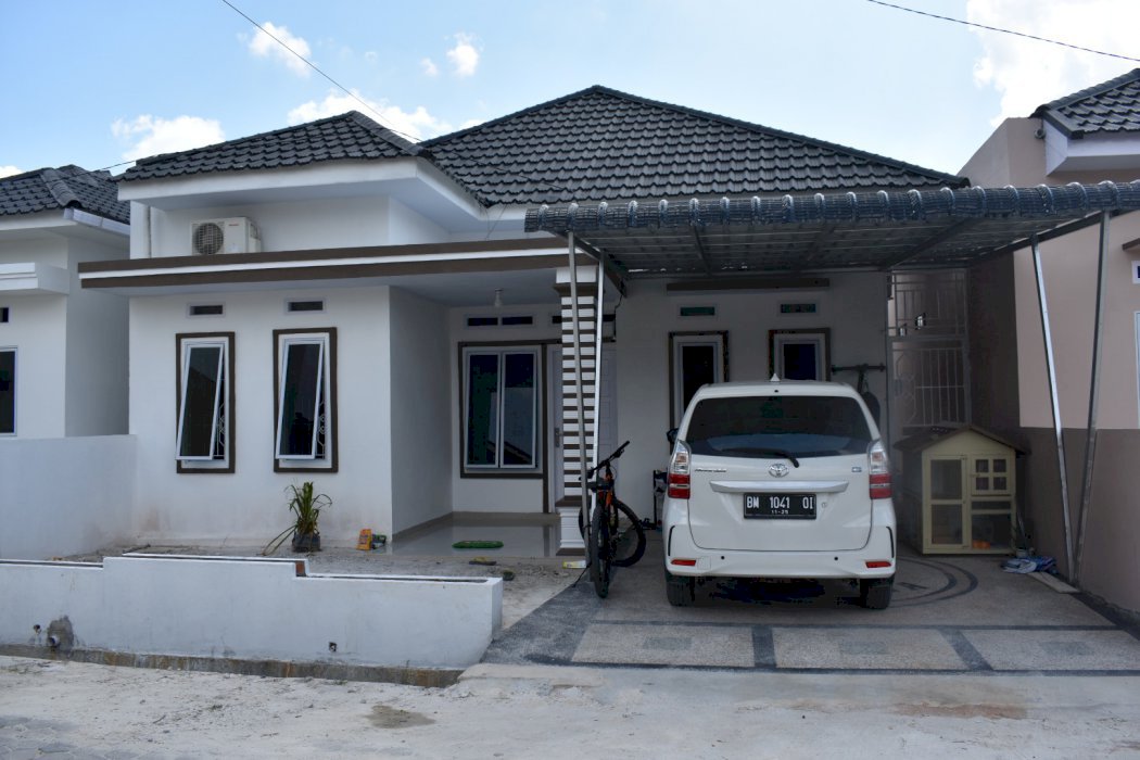 RUMAH IDAMAN KELUARGA BAHAGIA DI LINGKUNGAN CLUSTER