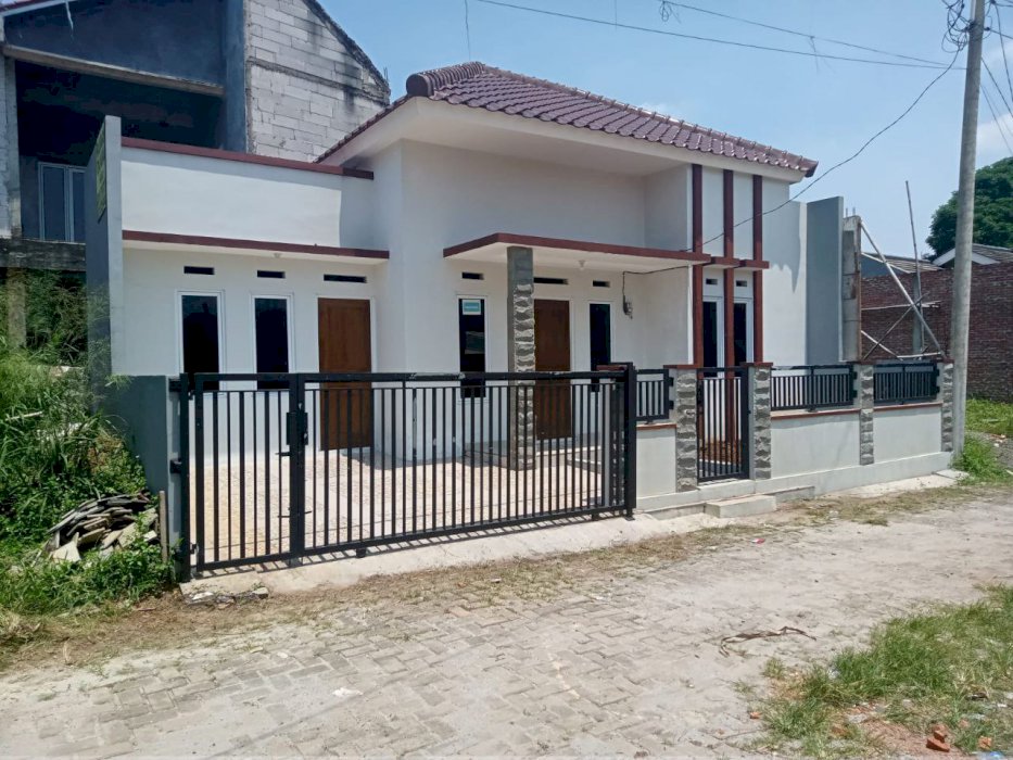 RUMAH minimalis Cantik dalam Cluster di kawasan strategis kALIMULYA DEPOK