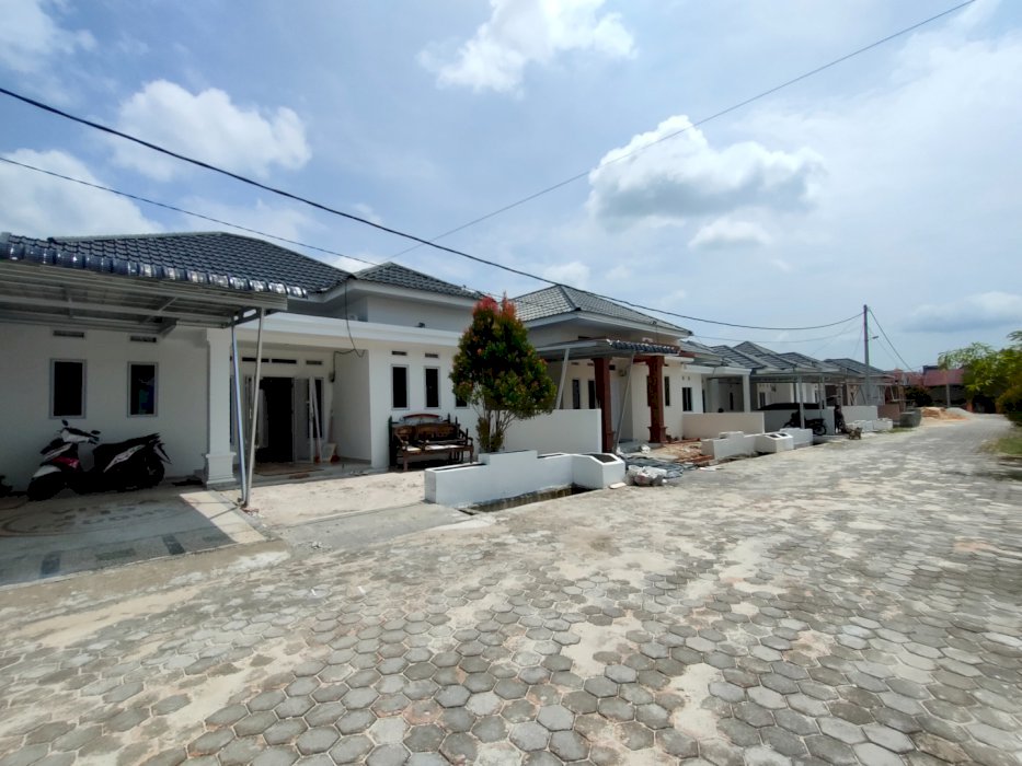 RUMAH MODERN CLUSTER ONE GATE SISTEM DI DELIMA