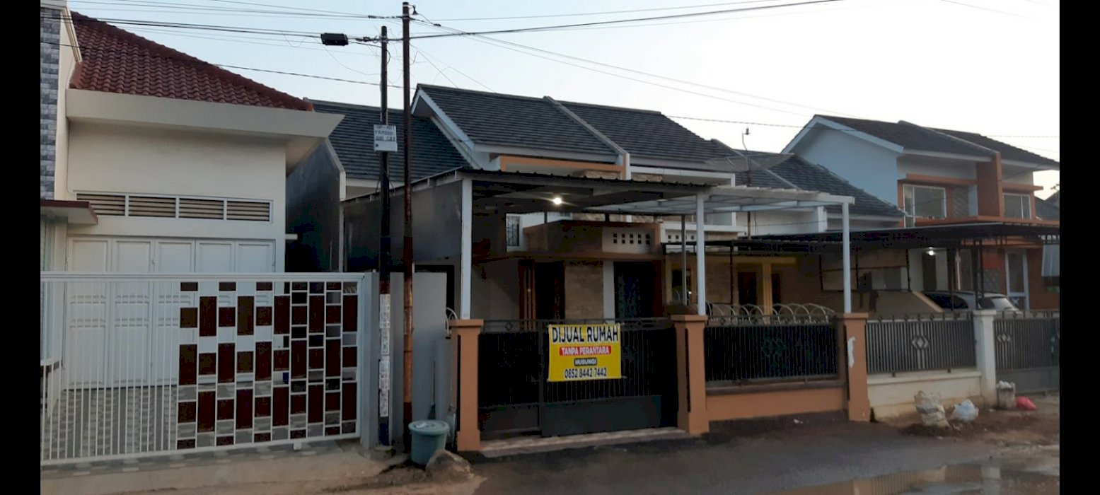 rumah cluster minimalis pinggir jalan besar