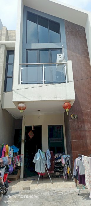 Over Kredit rumah 2 lantai