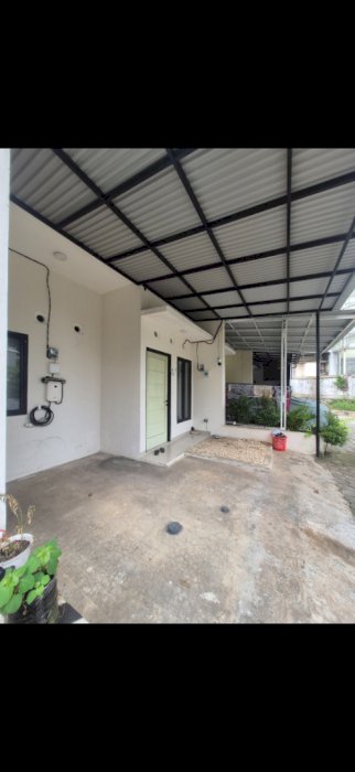 Over kredit rumah cluster